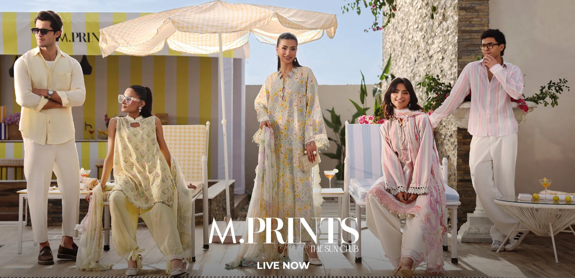 Three people in light-colored outfits by a pool with 'M. Prints' branding.1621243260e1af0c20-0